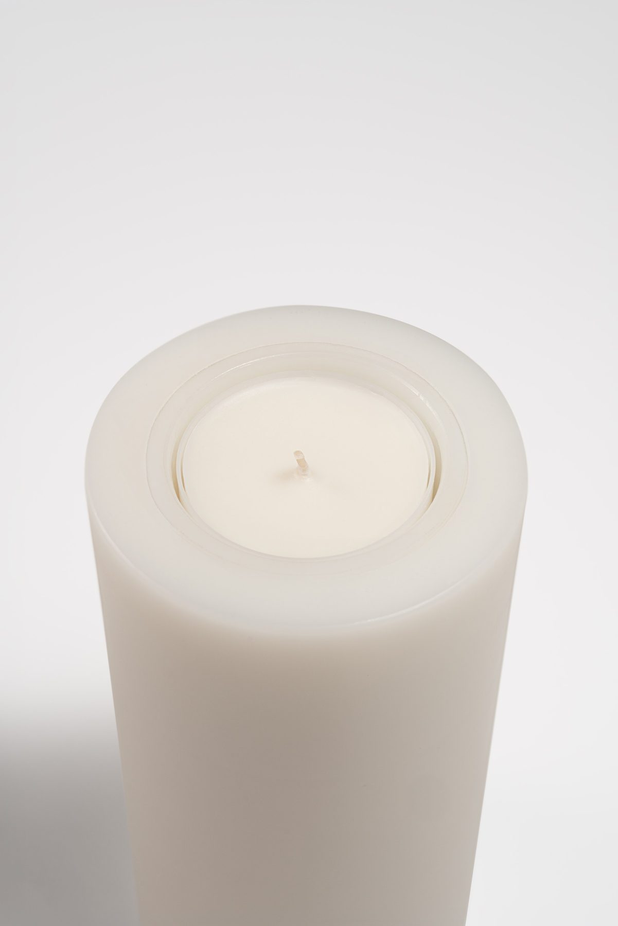 Soy wax pod resting in the Safety Insert